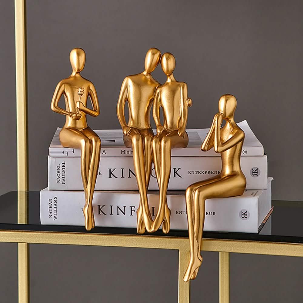 Golden Abstract Resin Sculptures – Modern Sitting Figures (Holding Flowers, Shy Pose, Hugging Couple) - Holding flowers -