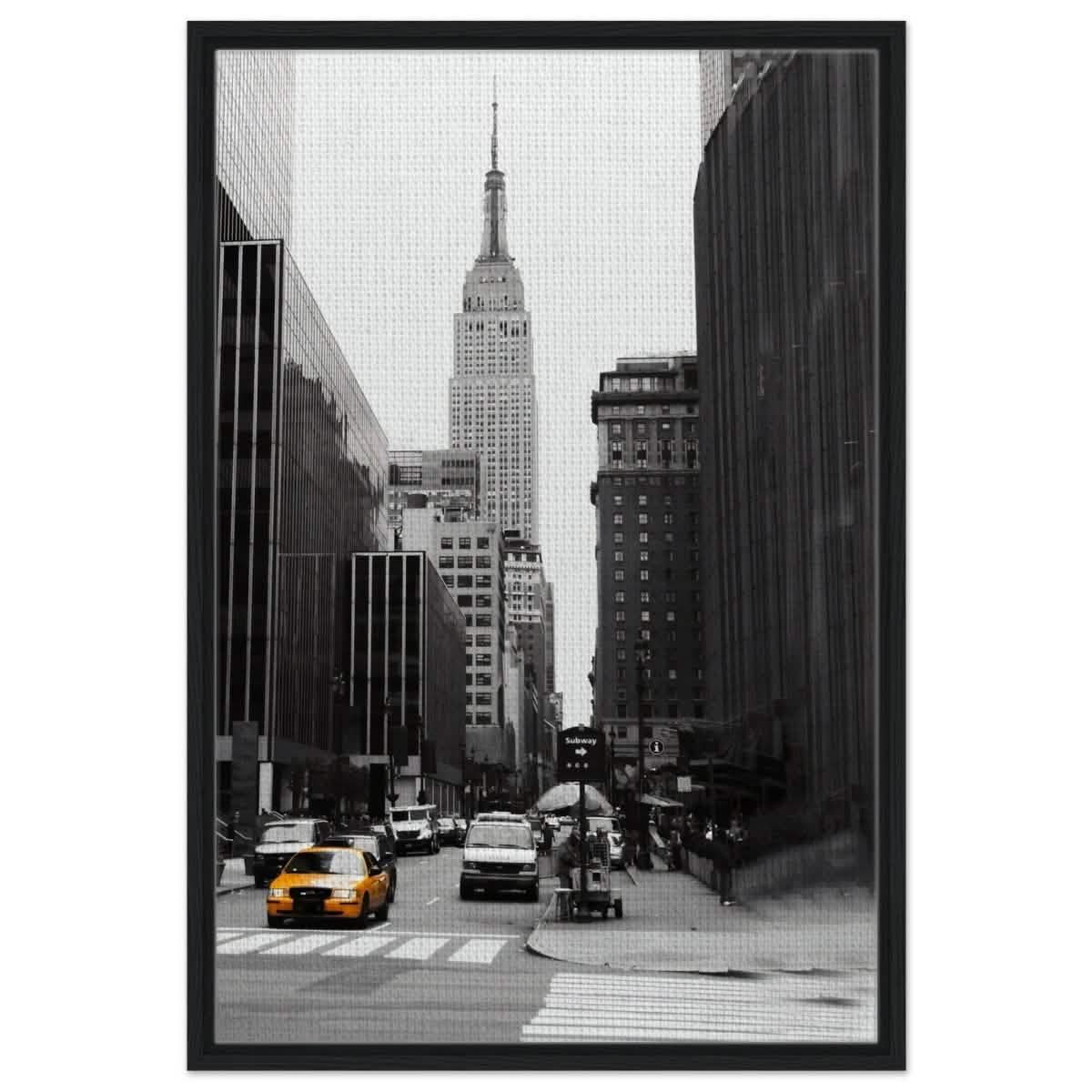 Manhattan Moments - Empire State Tower and Yellow Cab - Framed Canvas - 60x90 cm / 24x36″ - Black frame