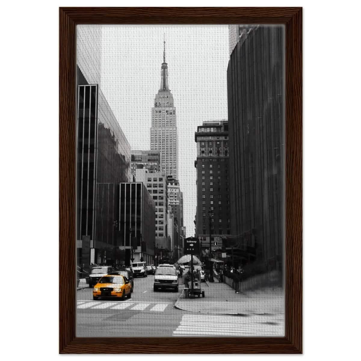 Manhattan Moments - Empire State Tower and Yellow Cab - Framed Canvas - 30x45 cm / 12x18″ - Dark wood frame