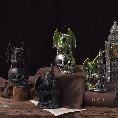 Collection of decorative figurines including a dragon, castle, and clock tower on a dark background.